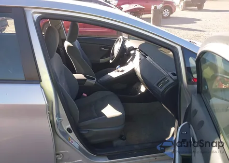 2012 Toyota Prius Plug-In z USA, uszkodzony, nr VIN JTDKN3DP9C3011259